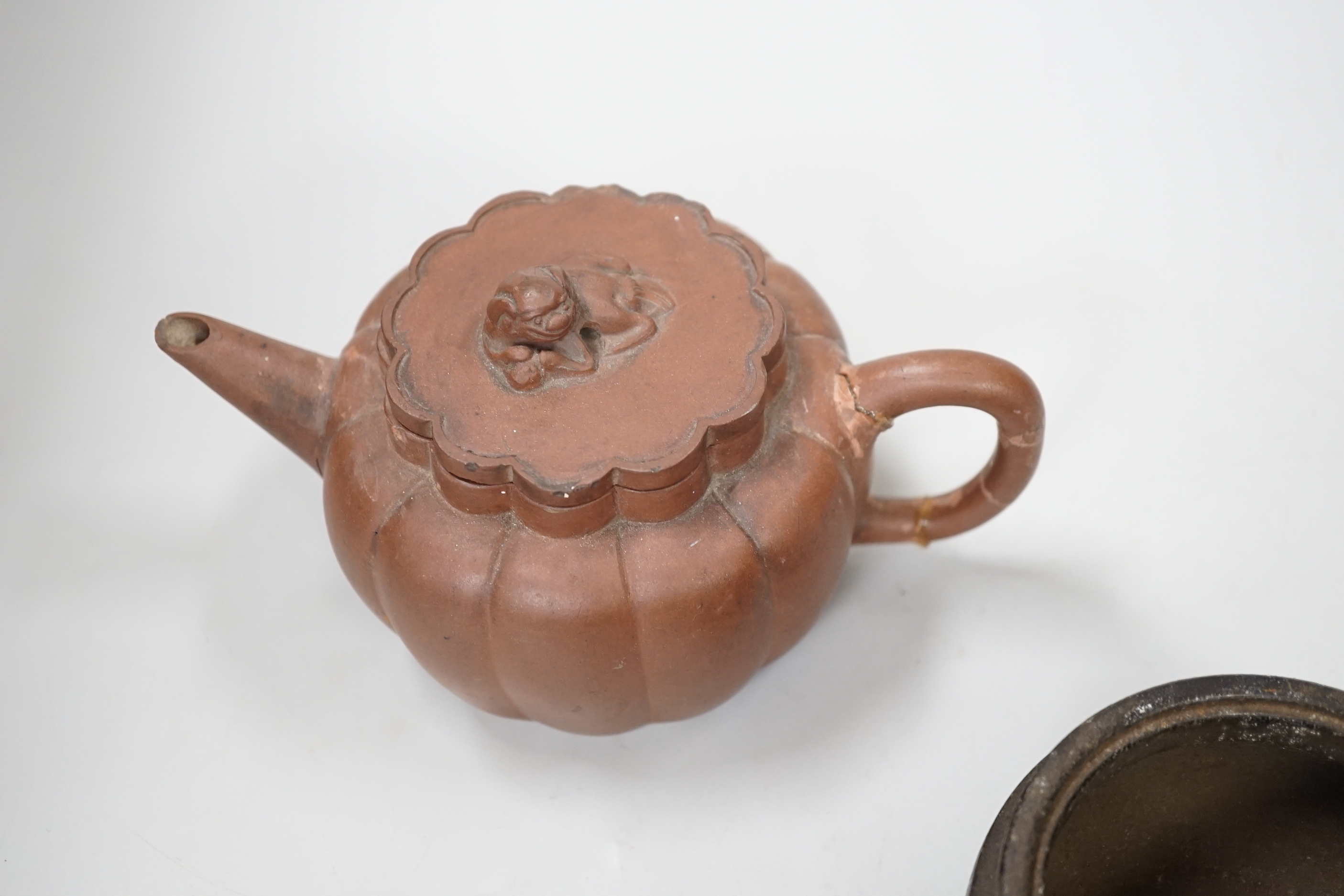 A Chinese Yixing teapot and a bronze censer, teapot 10 cm high